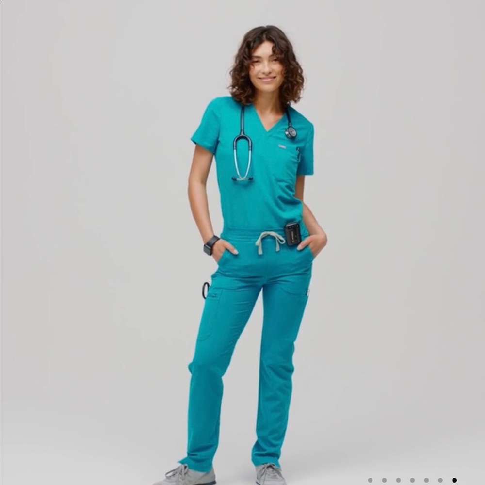 Figs limited edition Teal Yola scrub pants .